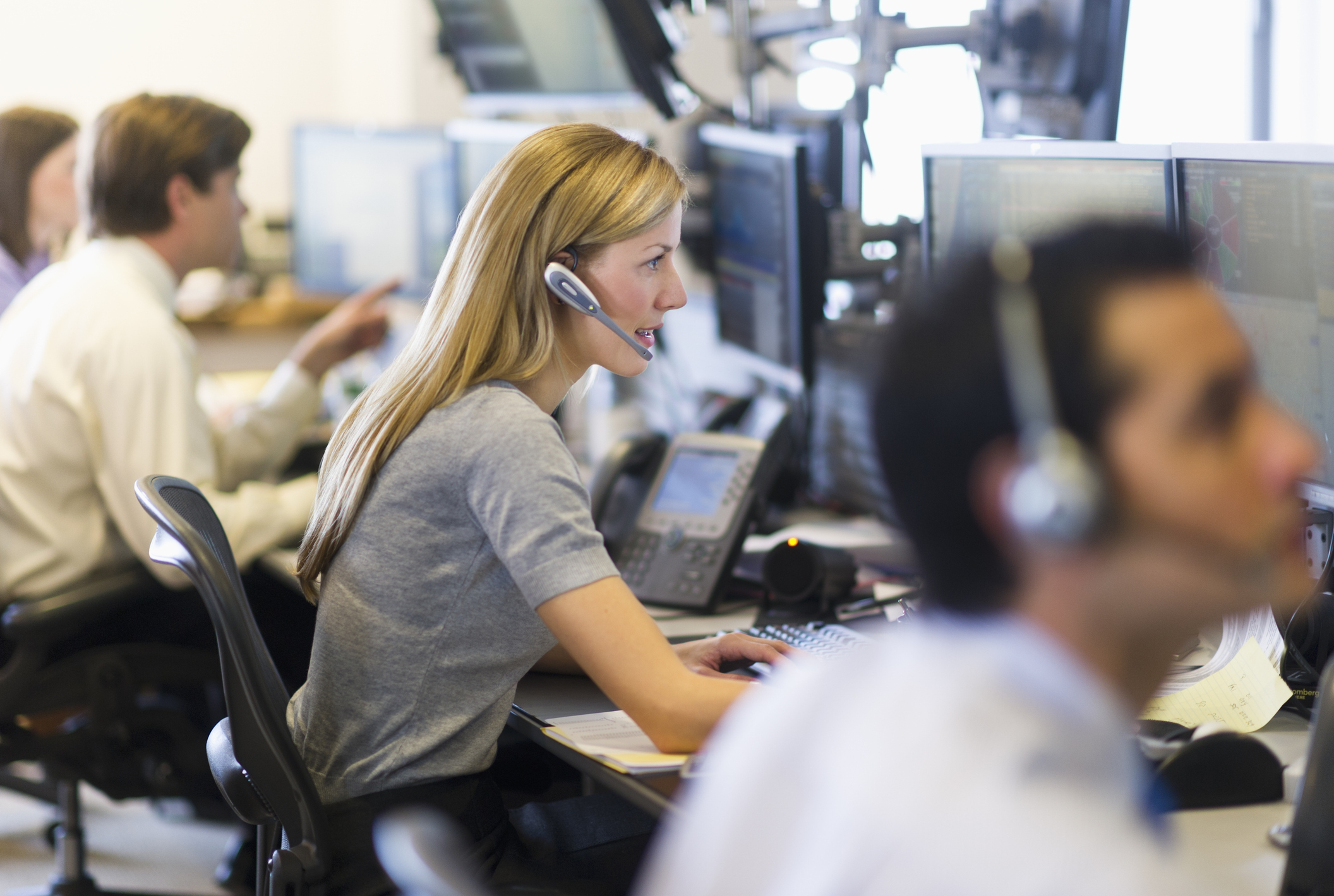 Financial services woman on trading desk GOLDMAN (Medium Resolution)